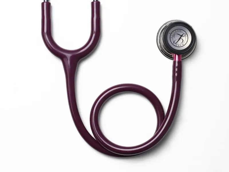 A stethoscope on a white surface
